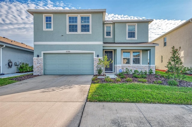 front of property with a garage