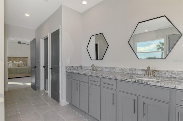 bathroom featuring tile patterned floors and vanity