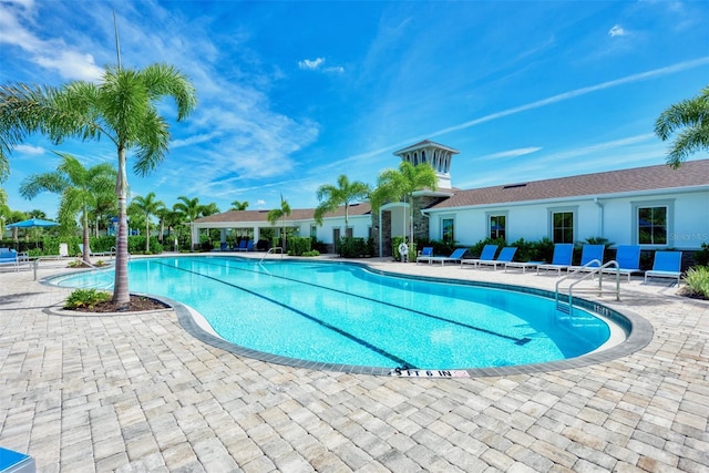 view of pool featuring a patio area