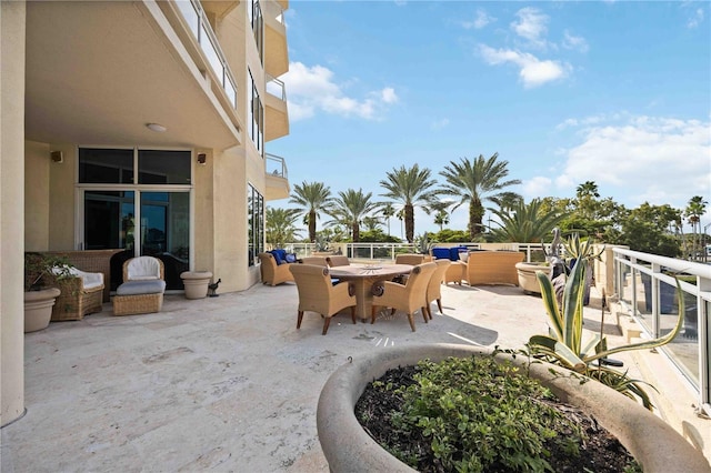 view of patio with outdoor dining area and an outdoor hangout area