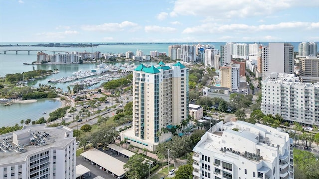 bird's eye view featuring a water view and a city view