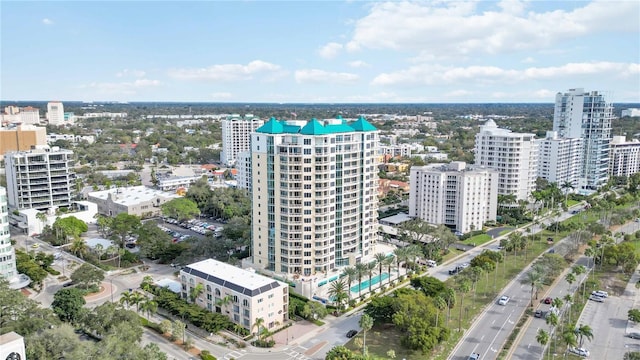 birds eye view of property with a city view