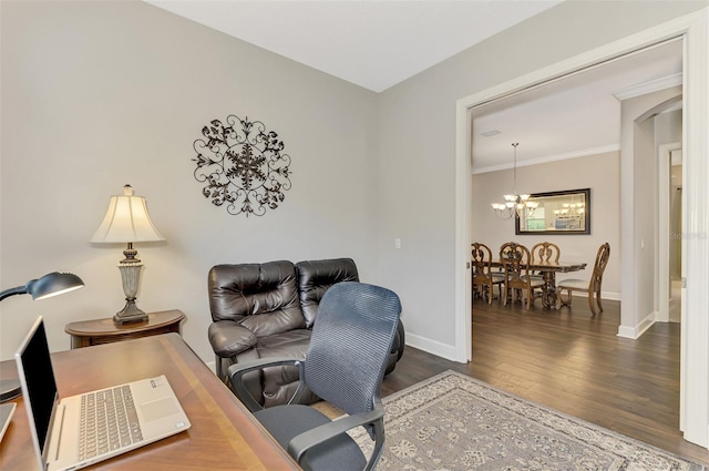 home office featuring a notable chandelier and dark hardwood / wood-style flooring