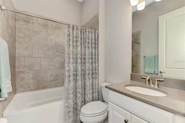 full bathroom with vanity, shower / bath combination with curtain, and toilet