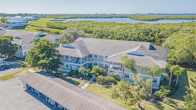 bird's eye view with a water view