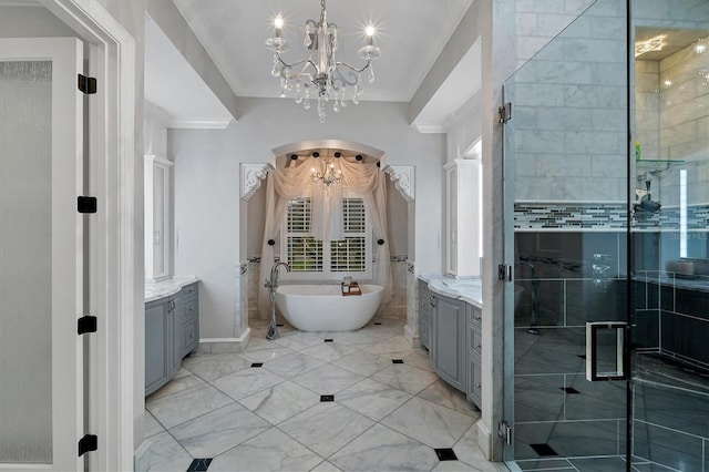 bathroom featuring ornamental molding, vanity, independent shower and bath, and a notable chandelier