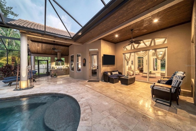 view of patio with an outdoor hangout area, area for grilling, and ceiling fan