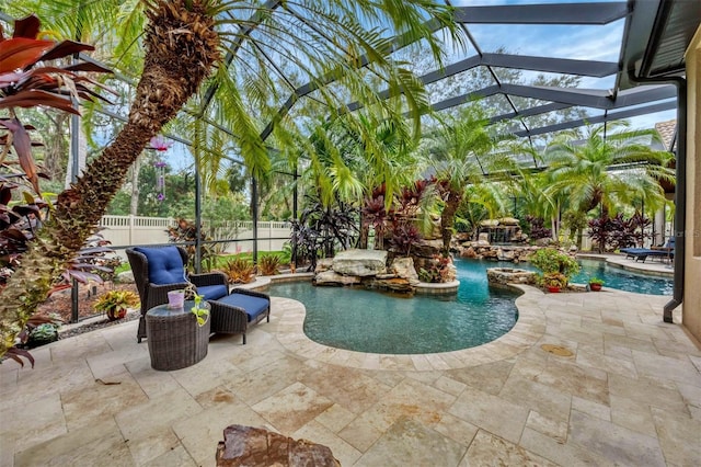 view of pool featuring a patio, a fenced backyard, a lanai, and a fenced in pool