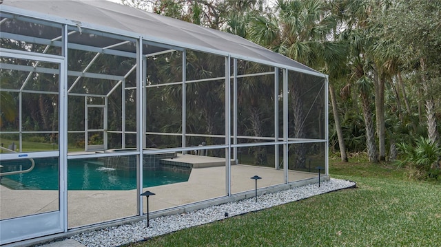 view of pool featuring a lanai and a patio