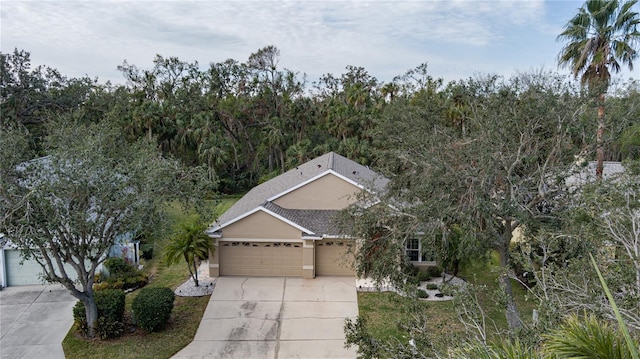 view of front of property featuring a garage