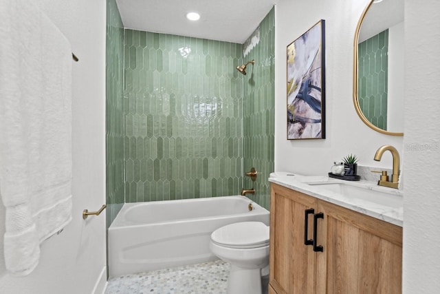 full bathroom with tiled shower / bath combo, vanity, and toilet