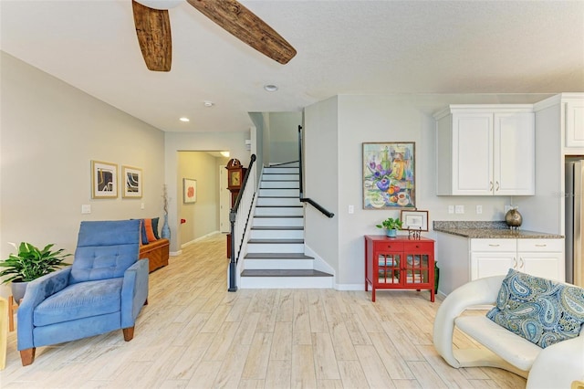 staircase featuring wood-type flooring