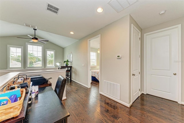 office space with dark wood-type flooring, lofted ceiling, plenty of natural light, and ceiling fan