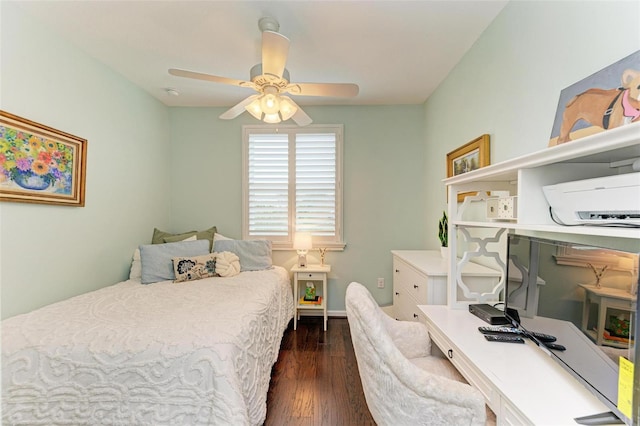 bedroom with dark hardwood / wood-style floors and ceiling fan