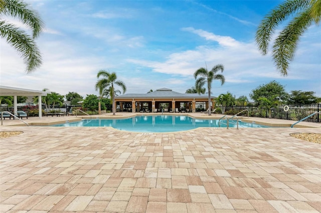 view of pool featuring a patio