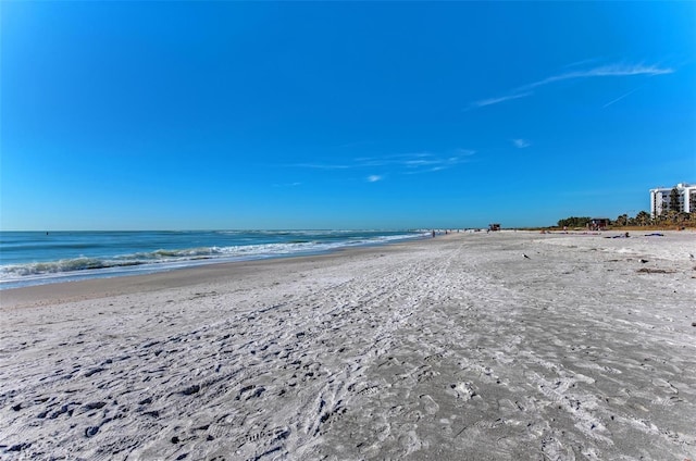 property view of water featuring a beach view