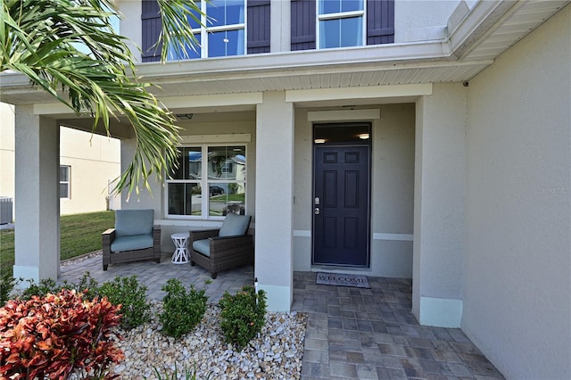 doorway to property with a porch