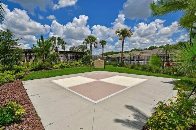 view of home's community with basketball court