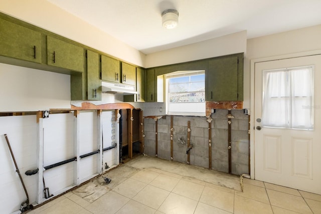 kitchen featuring green cabinets