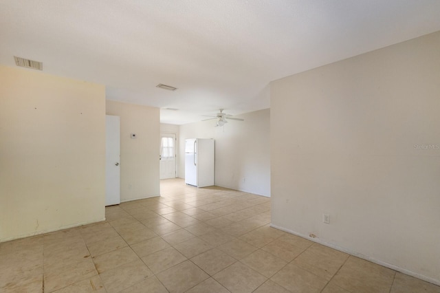 unfurnished room with ceiling fan