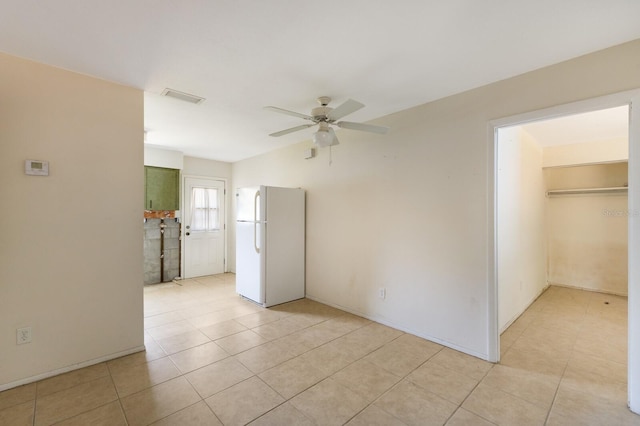 spare room featuring ceiling fan