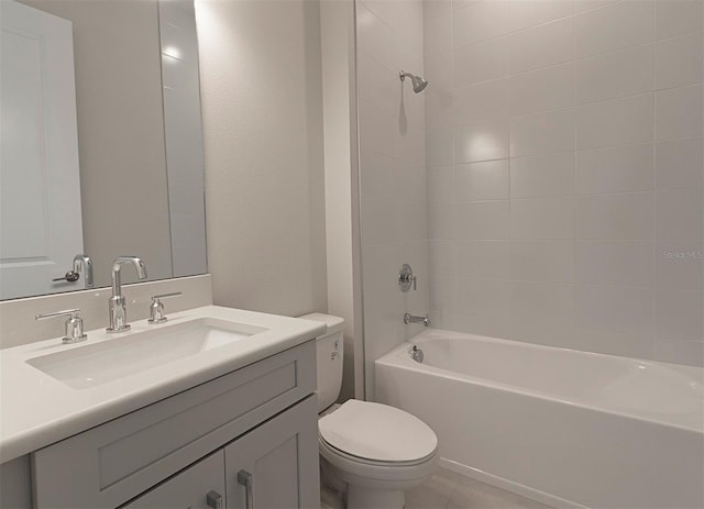 full bathroom featuring vanity, bathtub / shower combination, and toilet