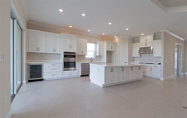 kitchen featuring white cabinetry, a center island, stainless steel appliances, wine cooler, and light tile patterned floors