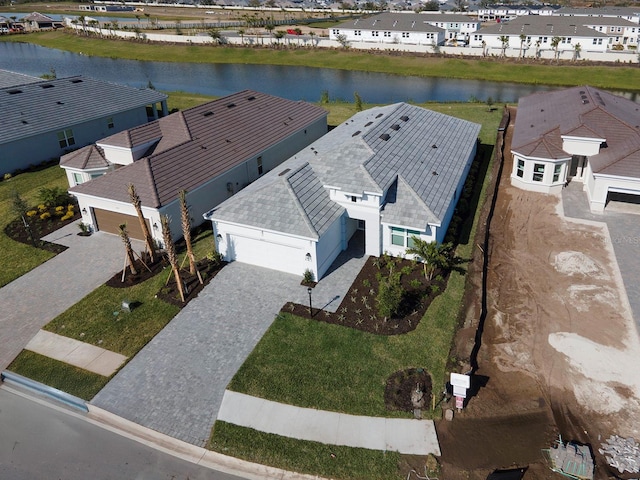 drone / aerial view featuring a water view