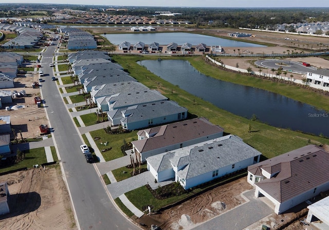 drone / aerial view with a water view