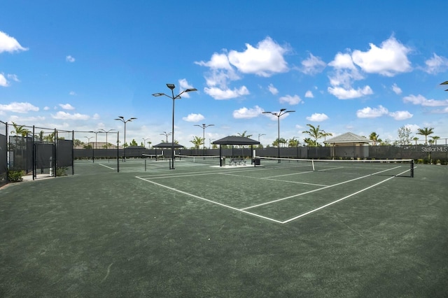 view of sport court with a gazebo