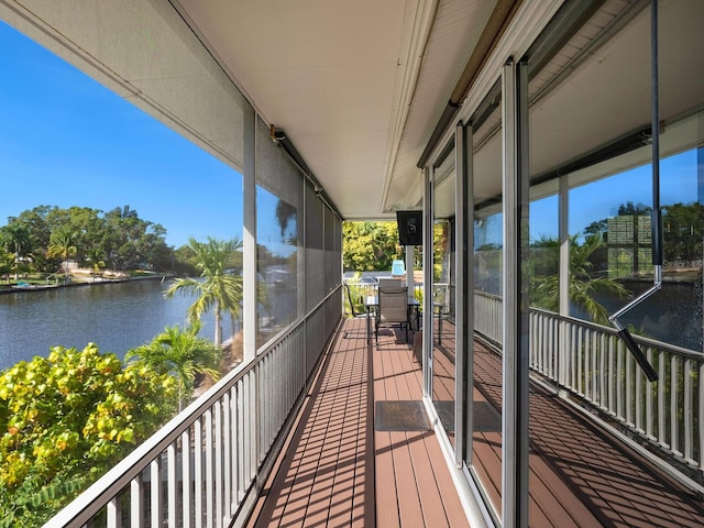 balcony featuring a water view