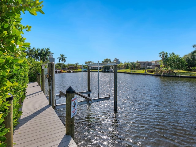 dock area featuring a water view