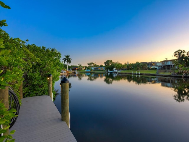 view of dock with a water view