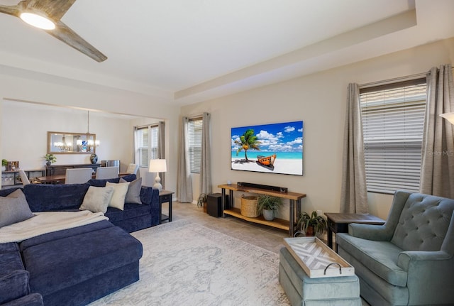 living room with an inviting chandelier