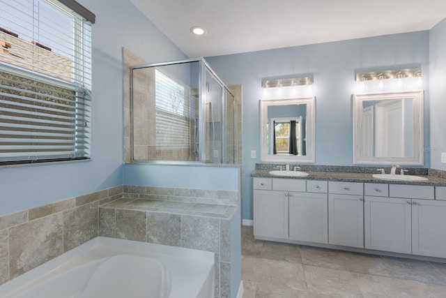 bathroom with a bathtub and vanity