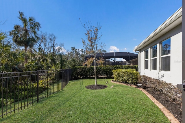 view of yard featuring a lanai