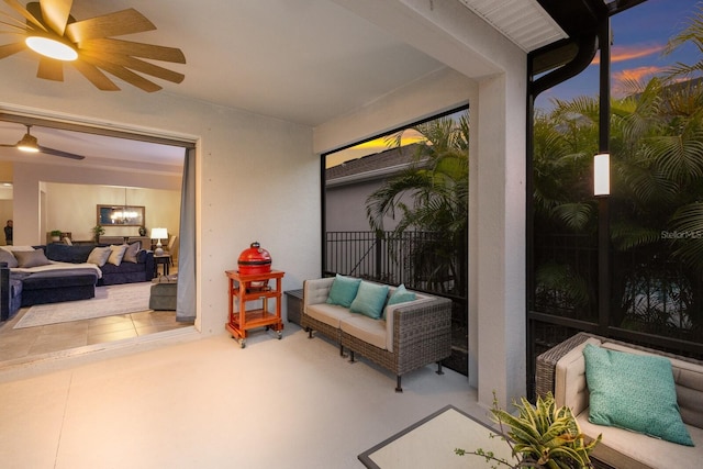 sunroom / solarium with ceiling fan