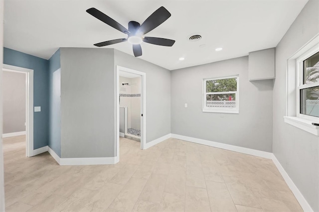 unfurnished room featuring ceiling fan