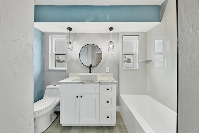 bathroom with hardwood / wood-style flooring, vanity, and toilet