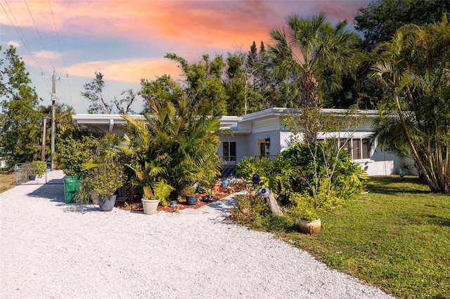 view of front of home featuring a yard