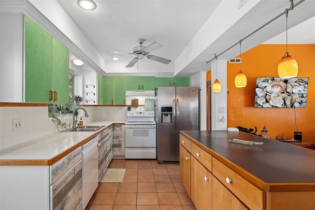 kitchen with white appliances, decorative light fixtures, sink, ceiling fan, and light tile patterned floors