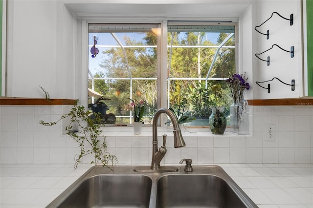 room details with backsplash and sink