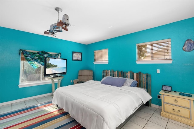 bedroom featuring light tile patterned floors