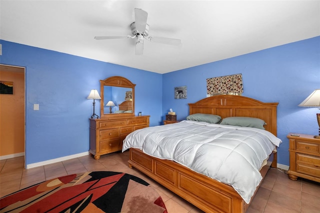 tiled bedroom with ceiling fan