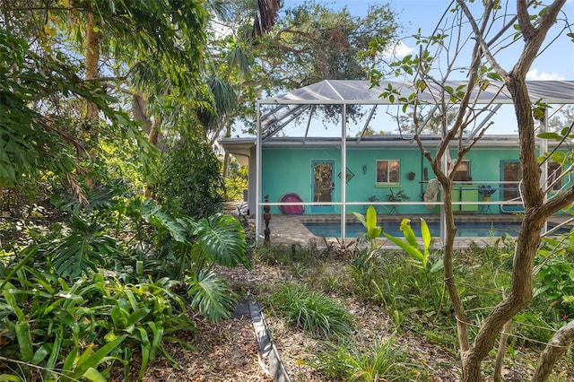 exterior space featuring a lanai