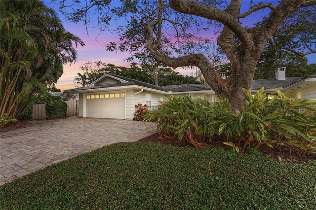 view of front of home with a garage