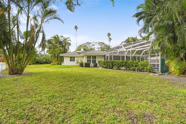 view of yard featuring a lanai