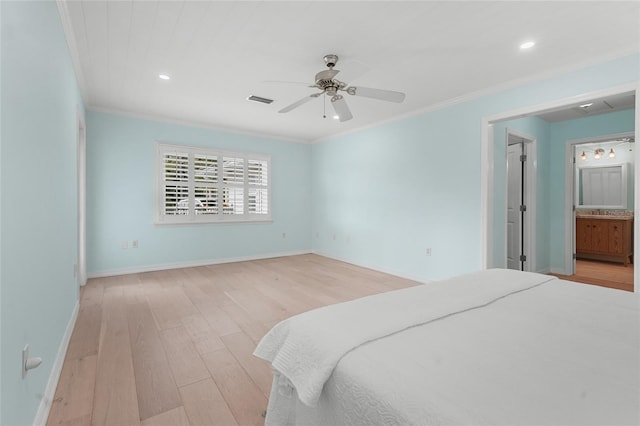 bedroom with ensuite bath, ceiling fan, crown molding, and light wood-type flooring