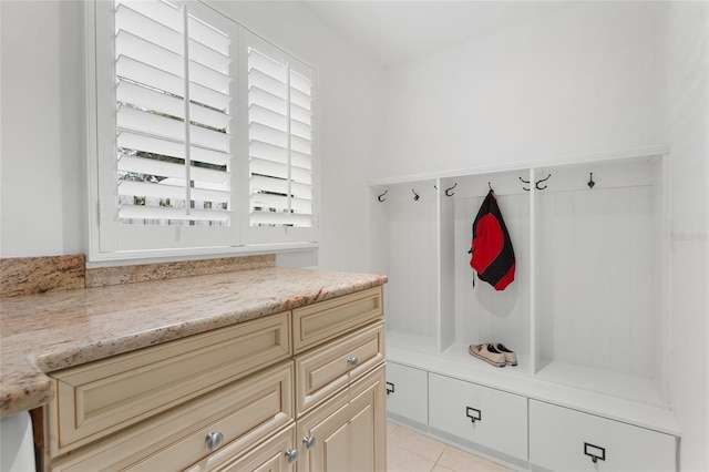 mudroom with light tile patterned floors