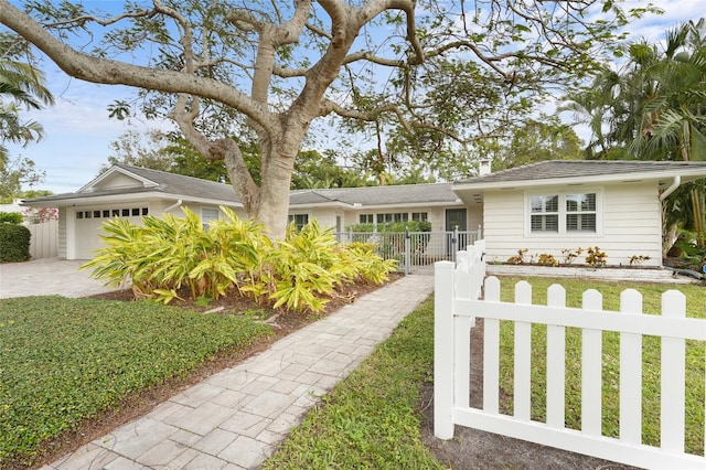 view of front of house with a garage